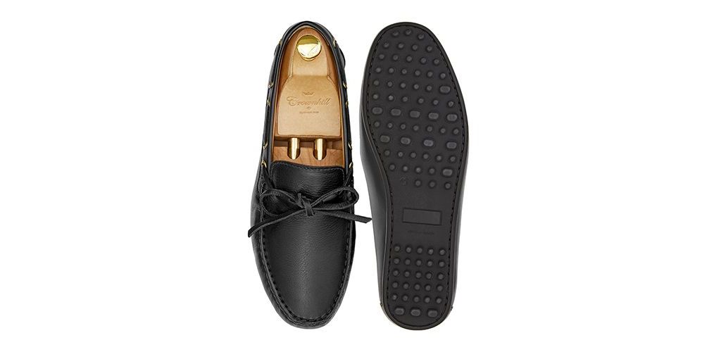 Driving shoe with a bow in dark brown shade. comfortable shoe for summer