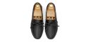 Driving shoe with a bow in dark brown shade. comfortable shoe for summer