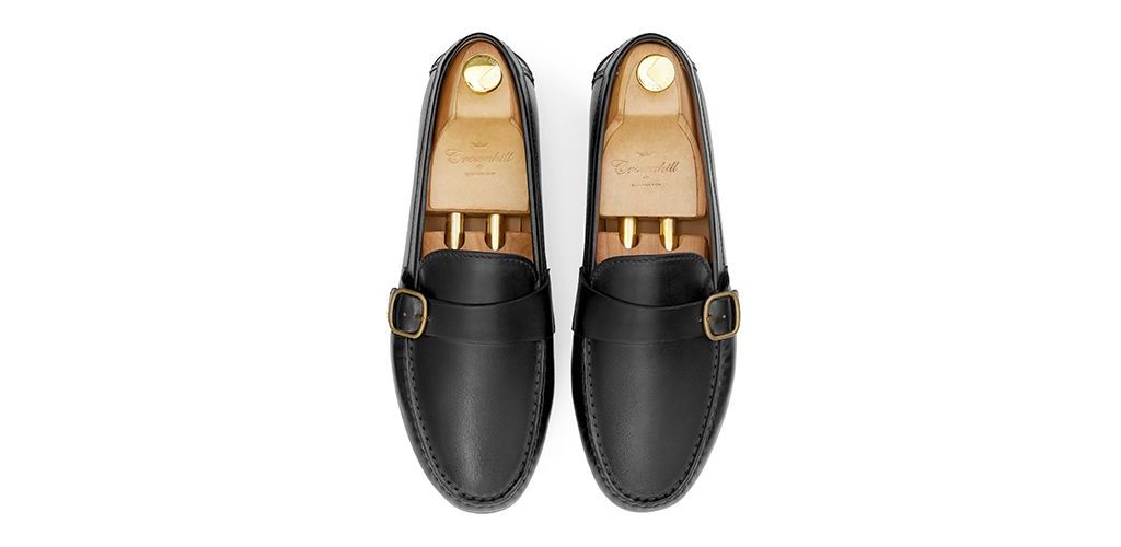 Loafers with side boucles. Comfortable brown leather moccasins for summer