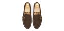Loafers with side boucles. Comfortable brown leather moccasins for summer