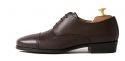 Dress shoe with openings on the sides of the strands which will loo especially for people with wide instep