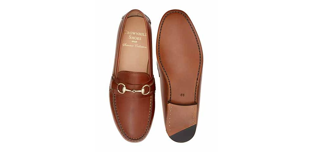 Loafers slip on buckle. Comfortable brown leather moccasins for summer