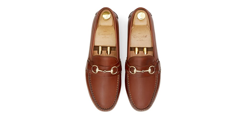 Loafers slip on buckle. Comfortable brown leather moccasins for summer