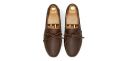 Driving shoe with a bow in dark brown shade. comfortable shoe for summer
