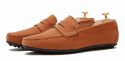 Moccasin shoe made with an eye mask quality to brown. comfortable shoe for summer