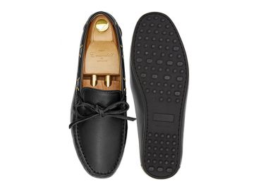 Driving shoe with a bow in dark brown shade. comfortable shoe for summer