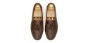 Driving shoe with a bow in dark brown shade. comfortable shoe for summer