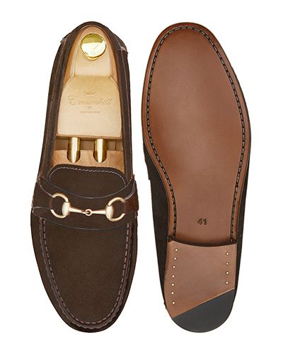 Loafers slip on buckle. Comfortable brown leather moccasins for summer
